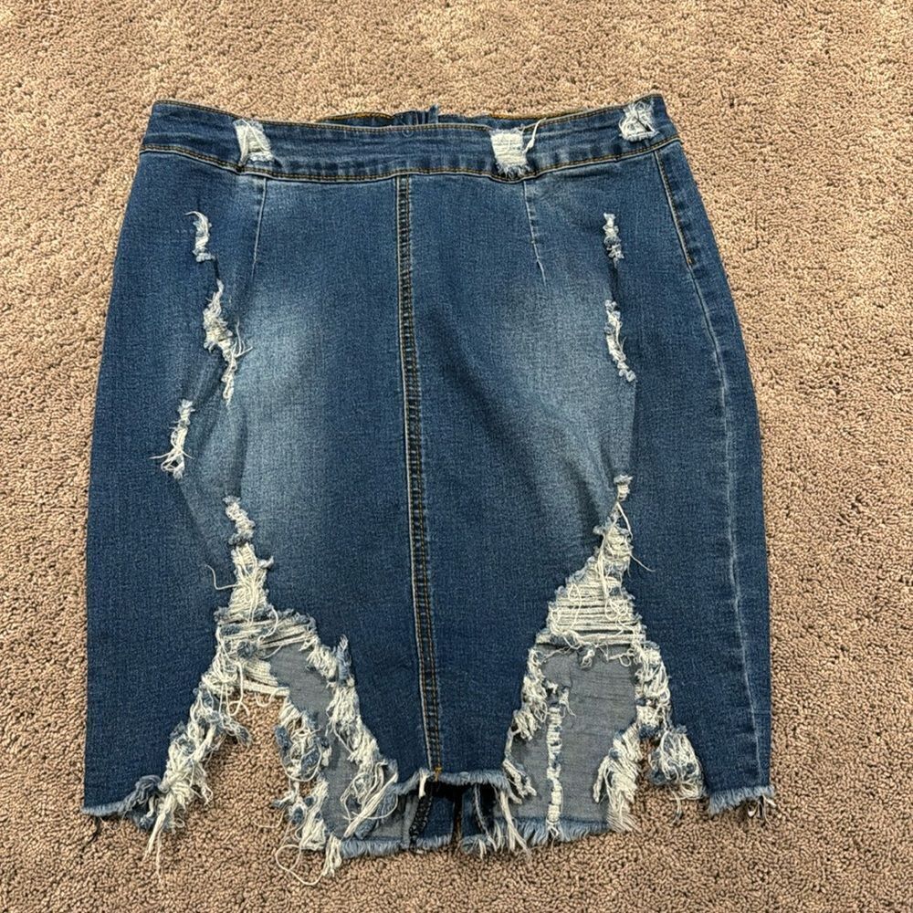 Super stretch denim skirt with distressing ! Size large